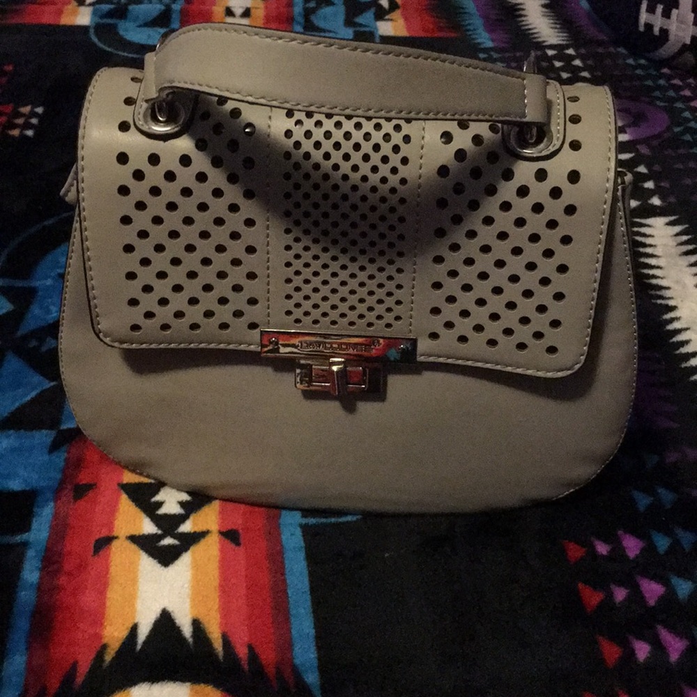 David Jones statement mini satchel in grey. Vents